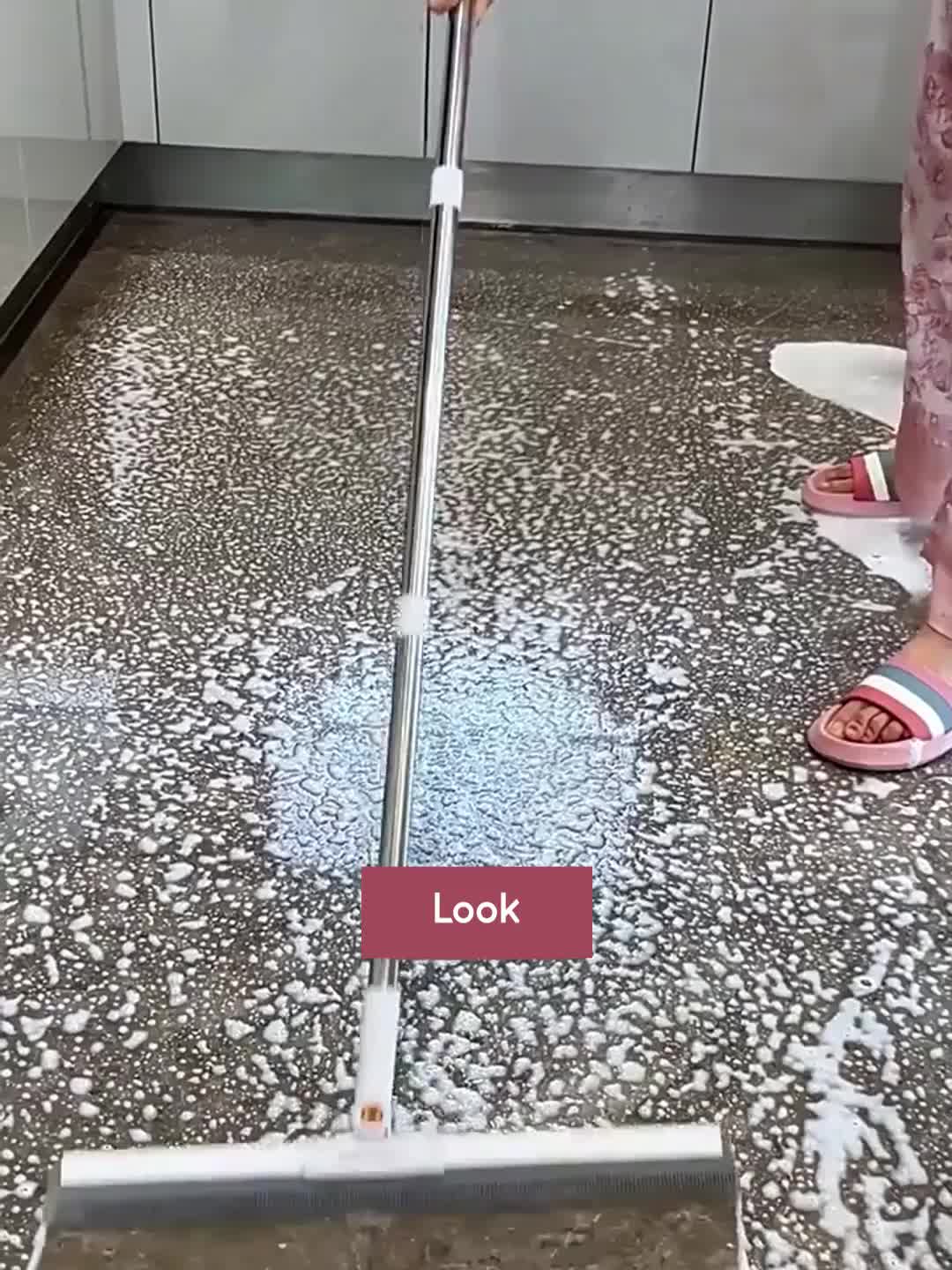 Floor mop with TPE brush strip