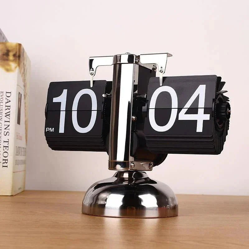 Retro flip clock with automatic rotating element