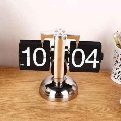 Retro flip clock with automatic rotating element